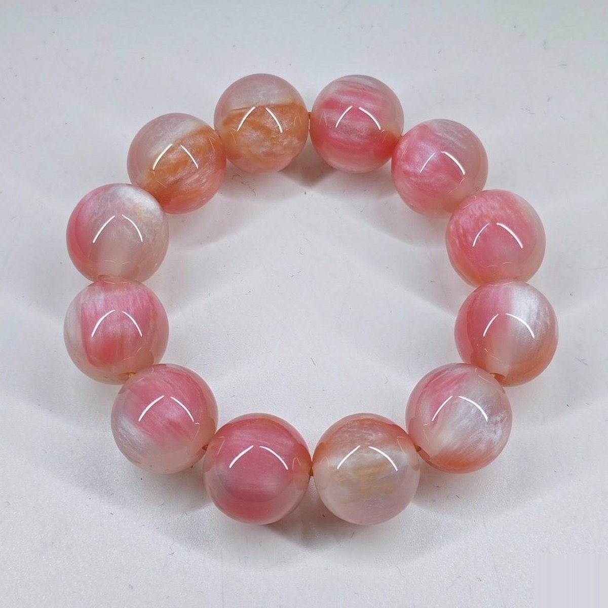 BEADORO Rose 20 mm resin beaded bracelet - worn on a wrist